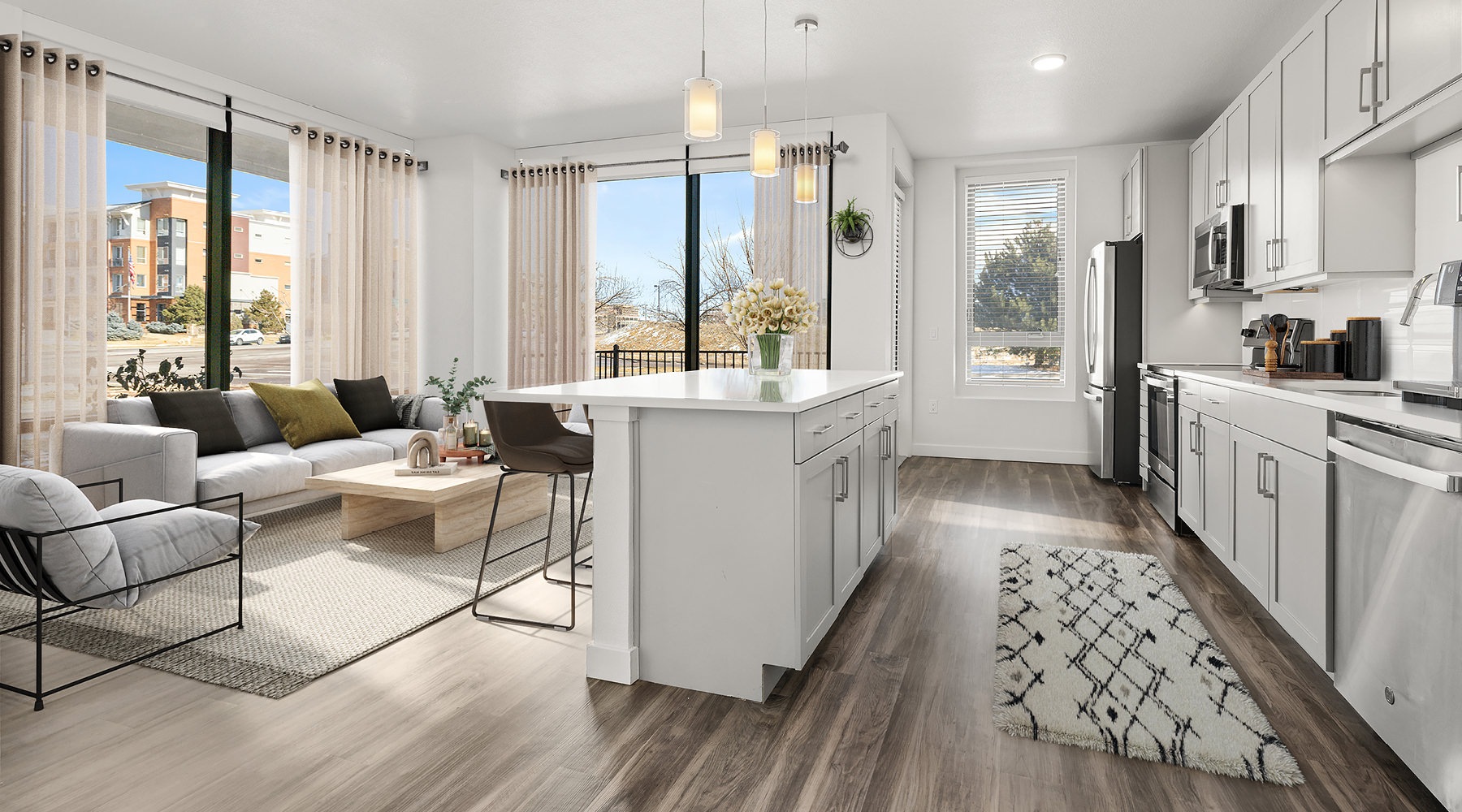 The essence of exceptional living Well-lit kitchen with ample counter space