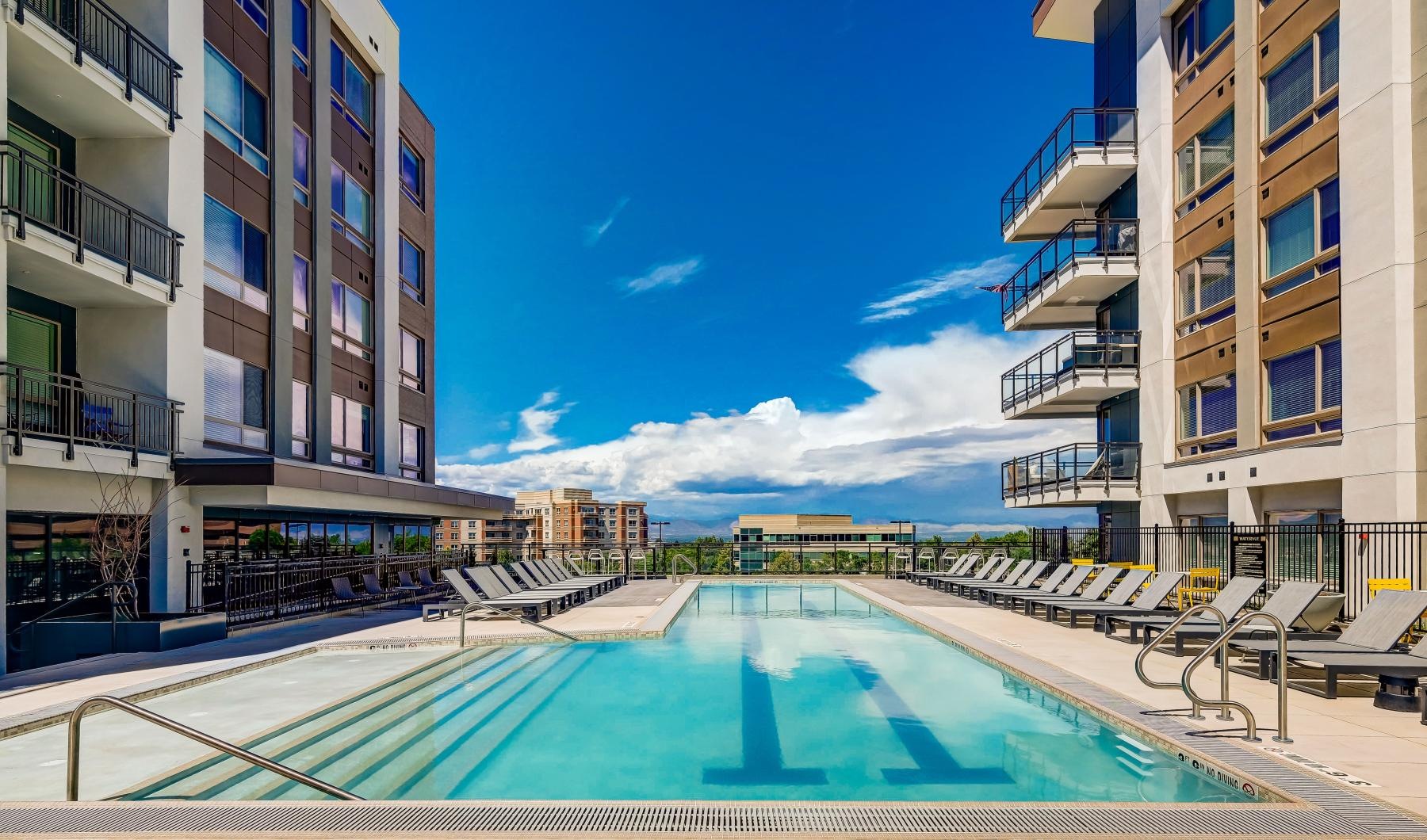 a swimming pool between buildings