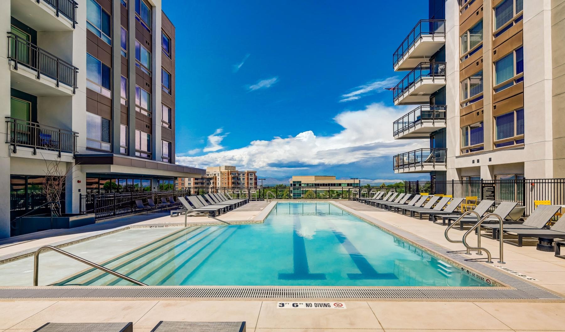 a swimming pool between buildings