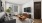 a living room with a tv and couches