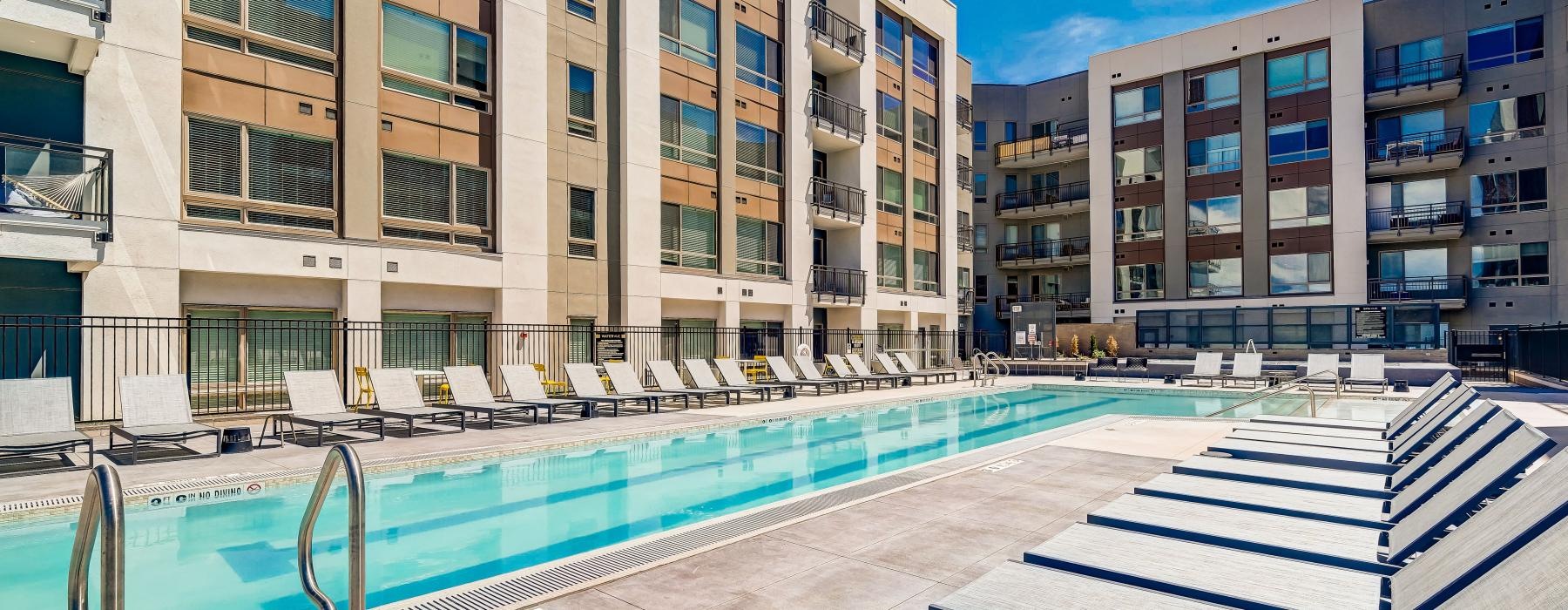 a swimming pool on the rooftop of a building