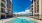 a swimming pool between buildings